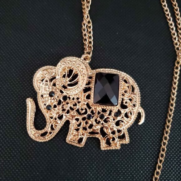 🐘 Sparkling Gold Trunks-Up Elephant Necklace: A Symbol of Elegance & Luck 🐘 - Picture 3 of 4